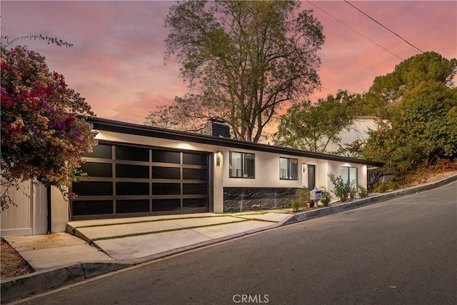 view of front of home featuring a garage