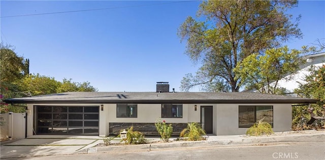 single story home with a garage