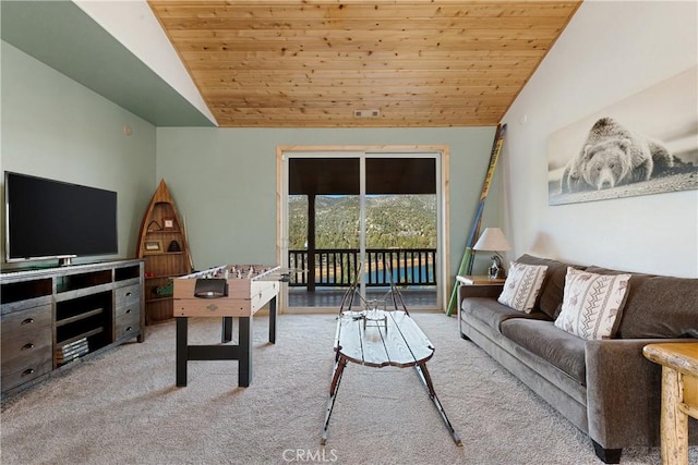 carpeted living room featuring wooden ceiling and vaulted ceiling