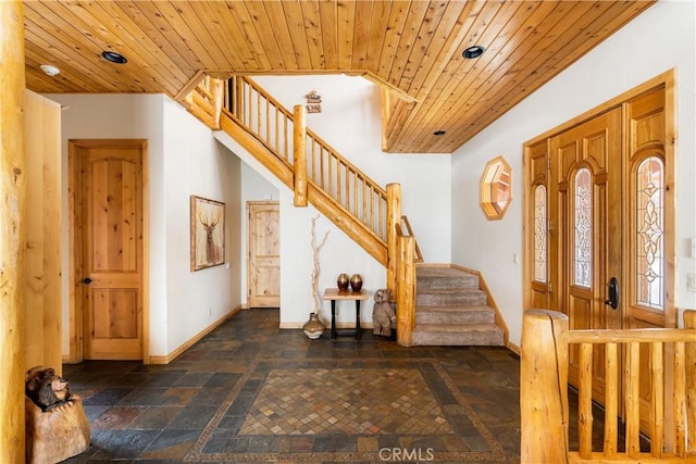 foyer entrance with wooden ceiling