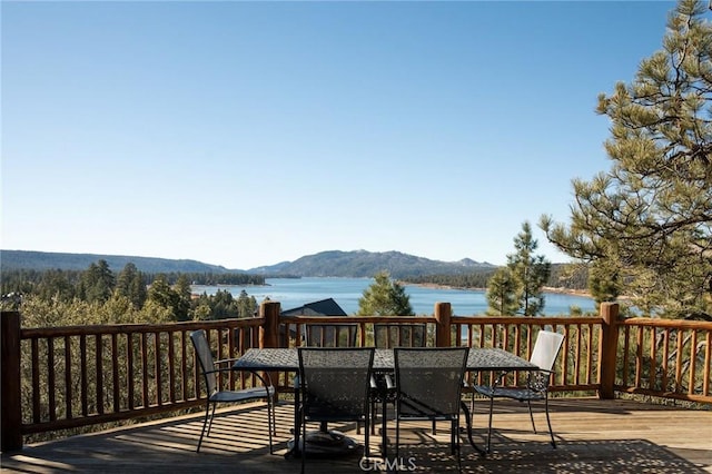 deck featuring a water and mountain view