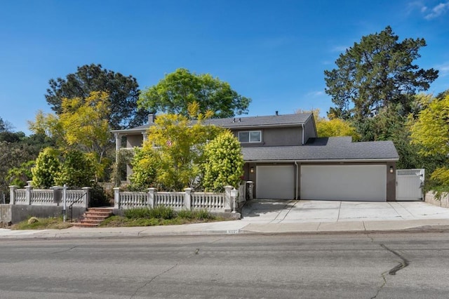 view of front of property with a garage