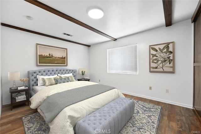 bedroom with dark hardwood / wood-style floors and beamed ceiling