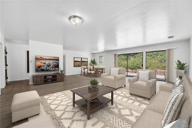 living room with light hardwood / wood-style floors