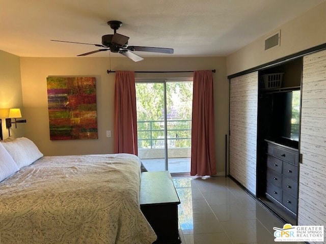 tiled bedroom with ceiling fan and access to outside