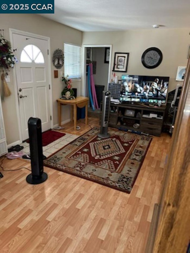 foyer featuring hardwood / wood-style floors