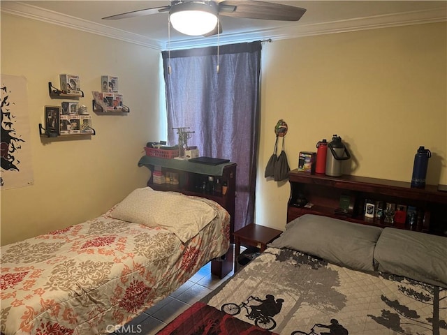 tiled bedroom with ceiling fan and crown molding