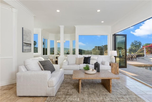 living room with ornamental molding