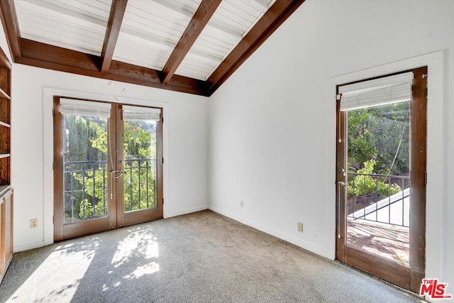 doorway with french doors, wood ceiling, light carpet, and vaulted ceiling with beams