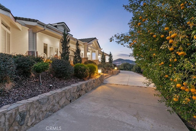 view of property exterior at dusk