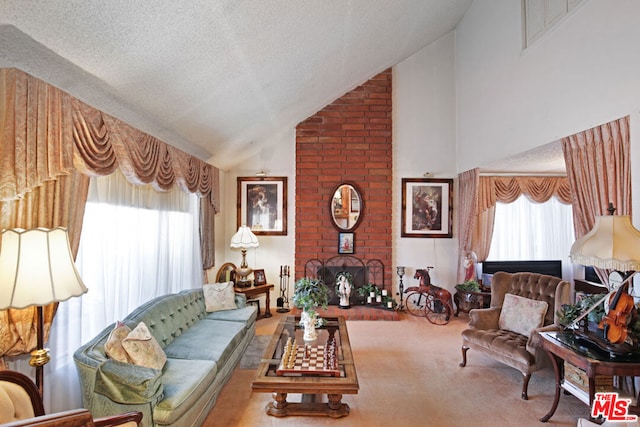 living room with lofted ceiling, a fireplace, carpet floors, and a textured ceiling