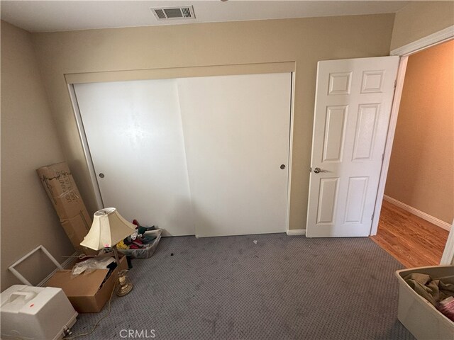 unfurnished bedroom featuring carpet