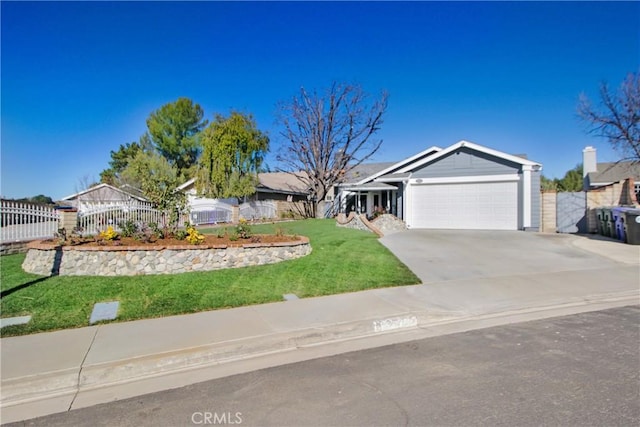 ranch-style home with a front lawn and a garage