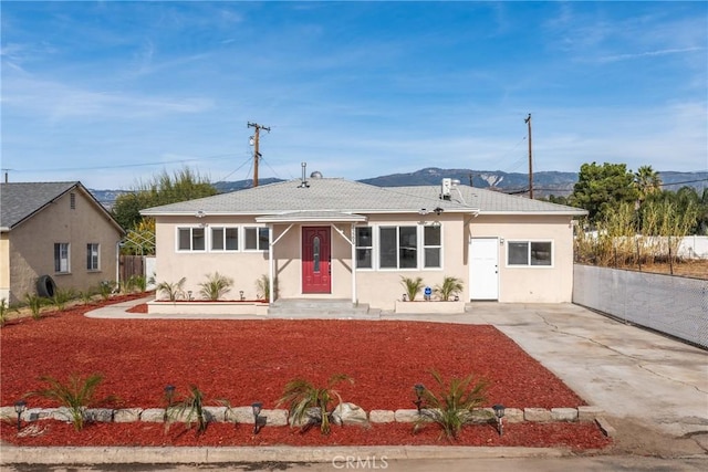 ranch-style house with a mountain view