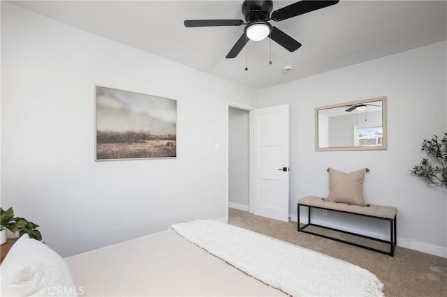 bedroom with ceiling fan and carpet flooring