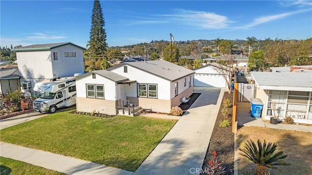 exterior space featuring a front yard and a garage