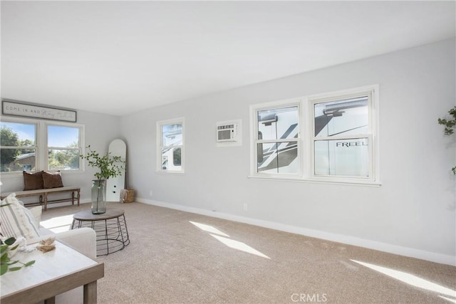 living room featuring a wall unit AC and carpet