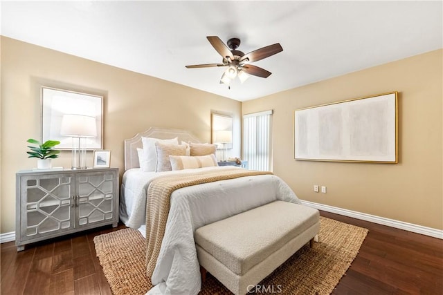 bedroom with dark wood-type flooring and ceiling fan