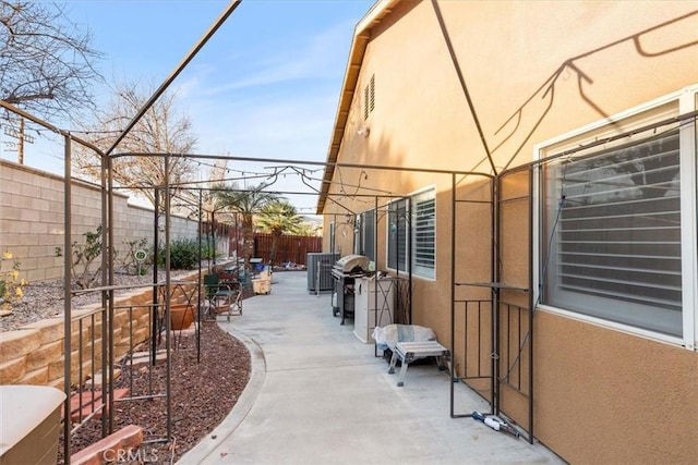 view of patio / terrace with a grill