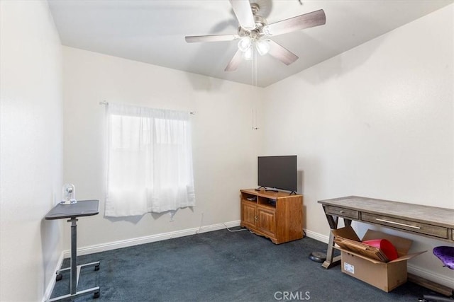 miscellaneous room with ceiling fan and dark carpet