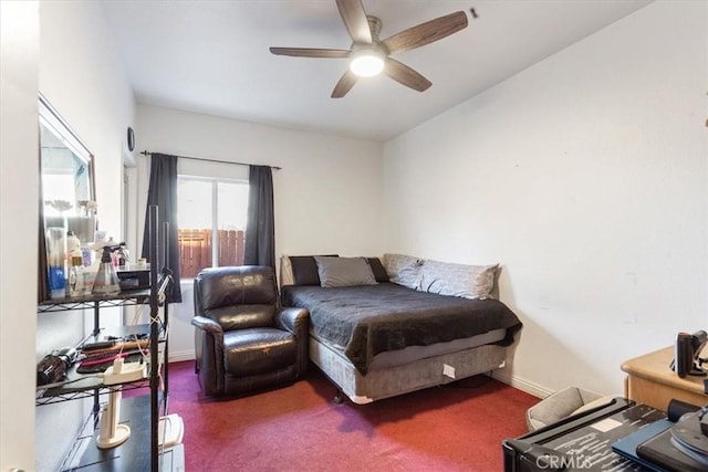 bedroom featuring ceiling fan and carpet flooring