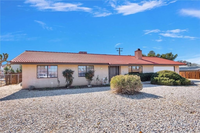 ranch-style house with a garage