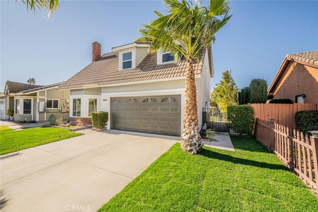 view of front of home featuring a front yard and a garage