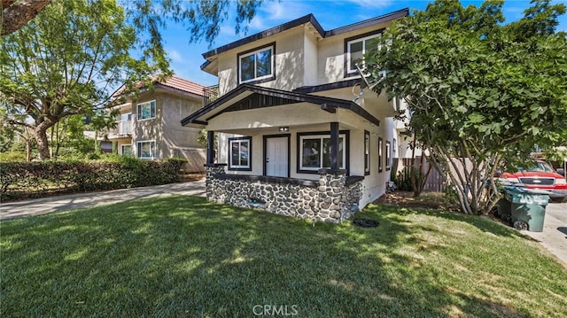 view of front facade with a front yard