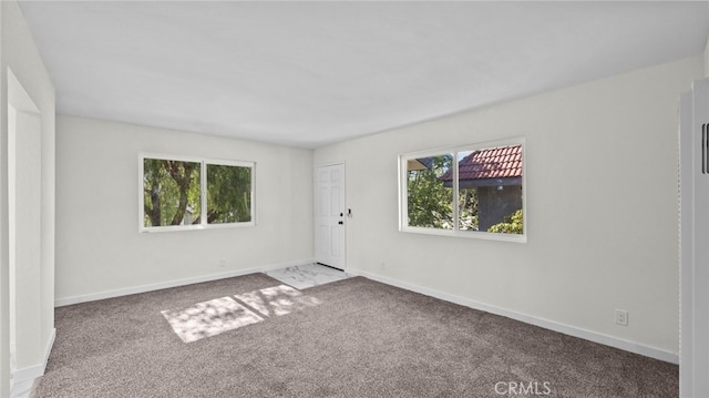 empty room featuring carpet