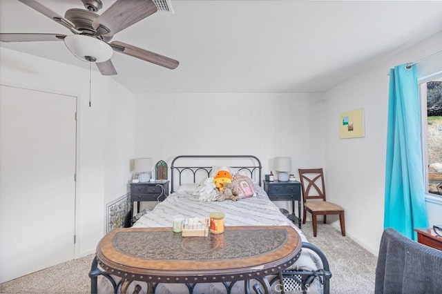 bedroom featuring ceiling fan and light colored carpet