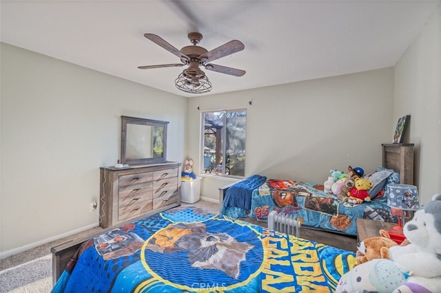 carpeted bedroom featuring ceiling fan