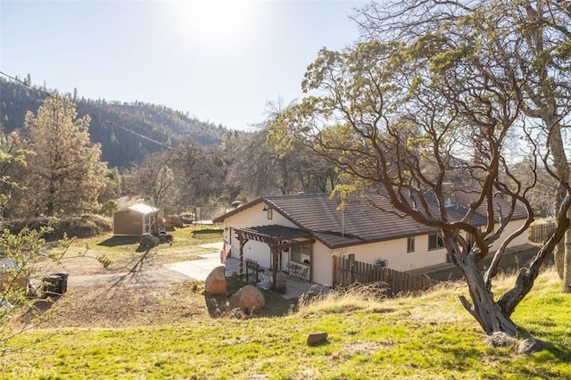 exterior space featuring a mountain view