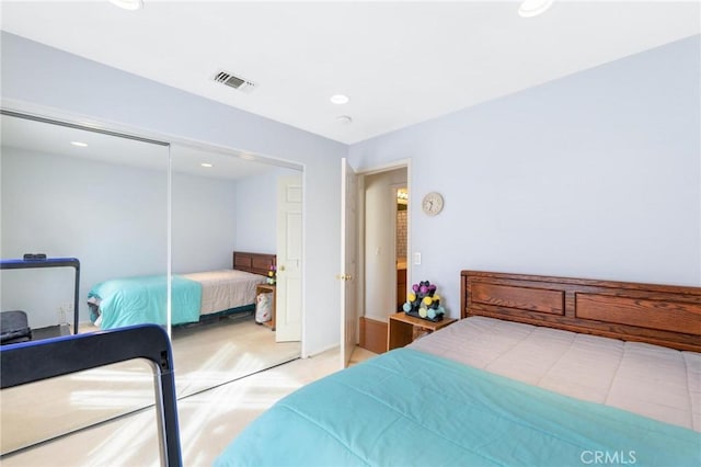 carpeted bedroom with a closet