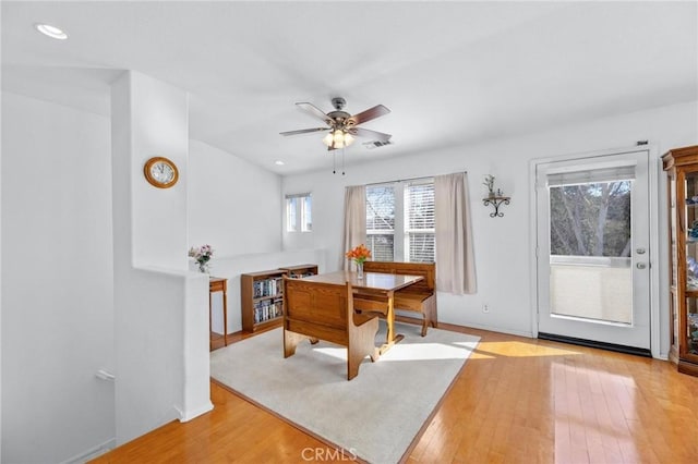 dining area featuring ceiling fan and light hardwood / wood-style flooring