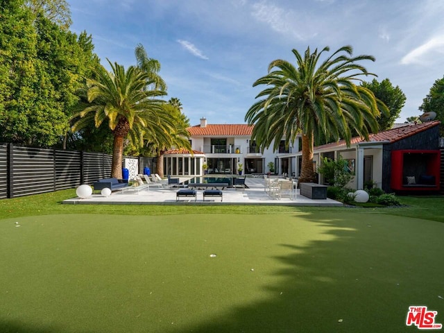 view of community with a patio