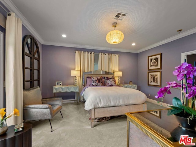 carpeted bedroom featuring crown molding