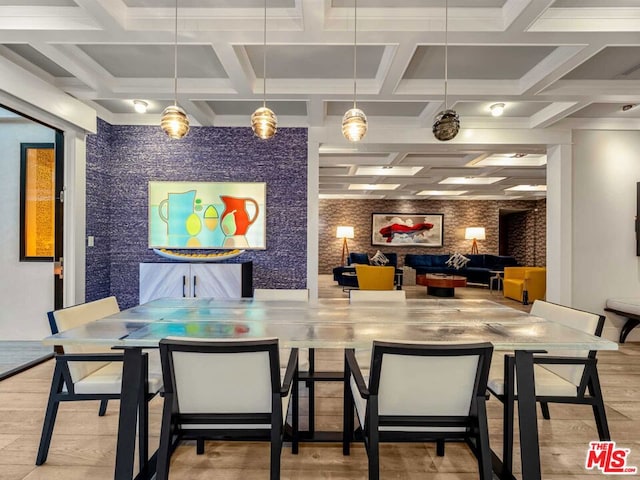 dining area featuring hardwood / wood-style flooring, brick wall, and coffered ceiling