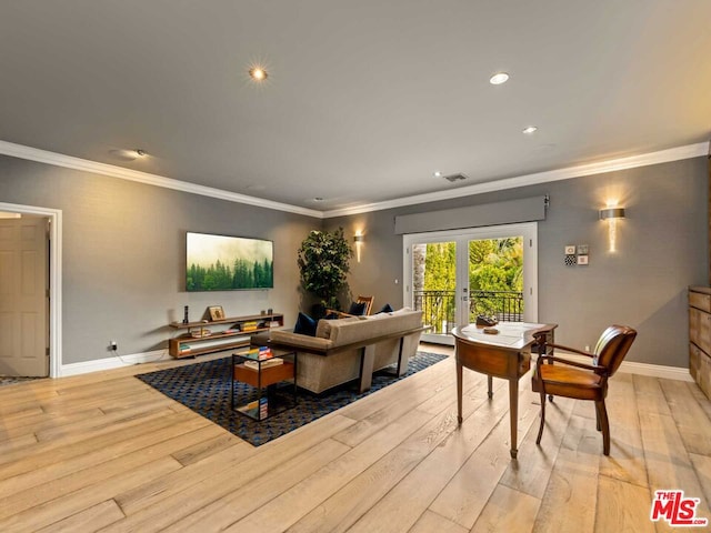 living room featuring light wood-type flooring, crown molding, and french doors