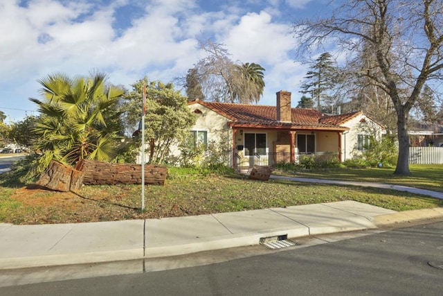 view of front of home with a front yard