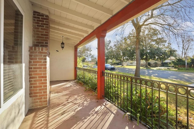 balcony featuring a porch