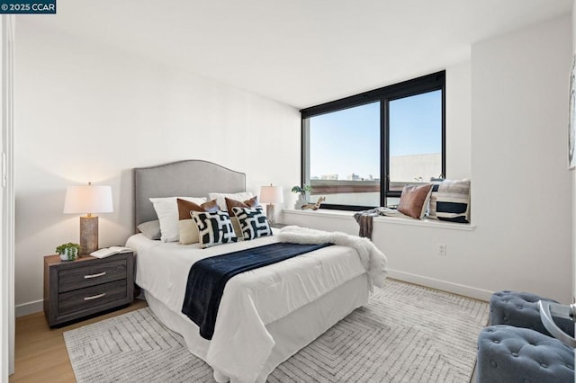 bedroom featuring light hardwood / wood-style flooring