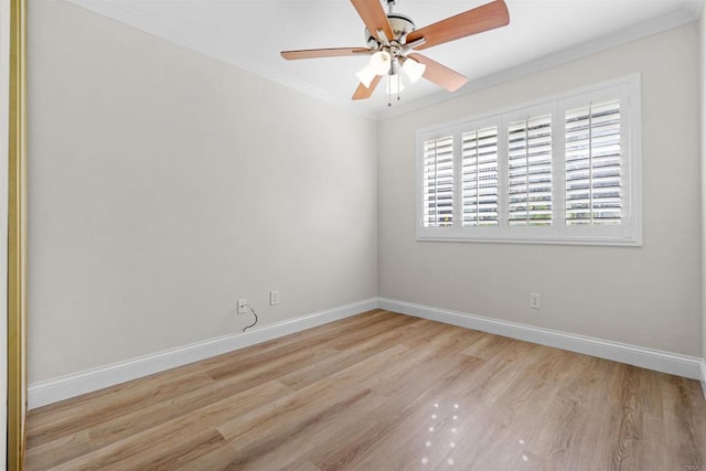 unfurnished room featuring ceiling fan, ornamental molding, and light wood-type flooring