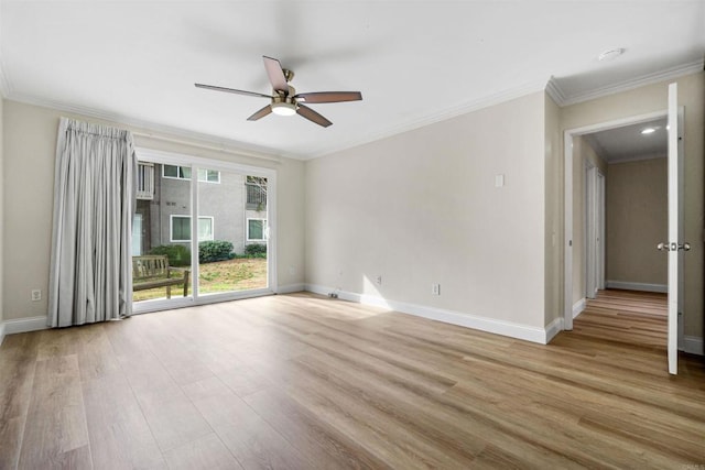 spare room featuring ceiling fan, ornamental molding, and light hardwood / wood-style flooring