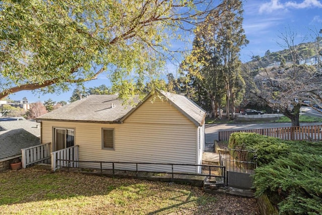 view of home's exterior with a yard