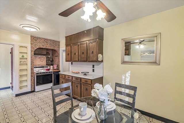 kitchen with white range with gas cooktop and built in features