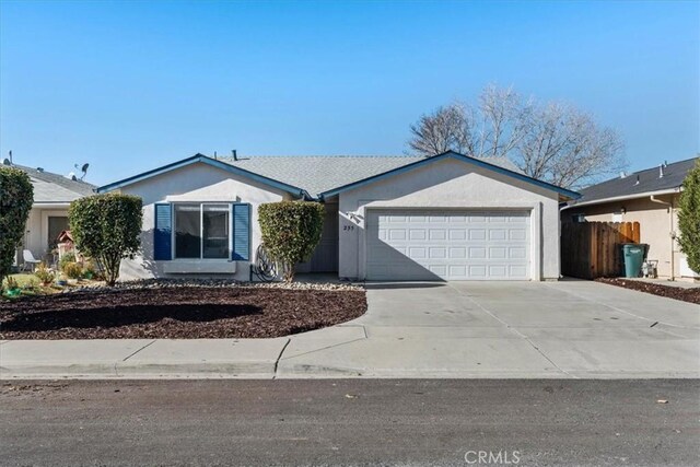 ranch-style home with a garage