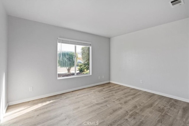 empty room featuring light hardwood / wood-style floors