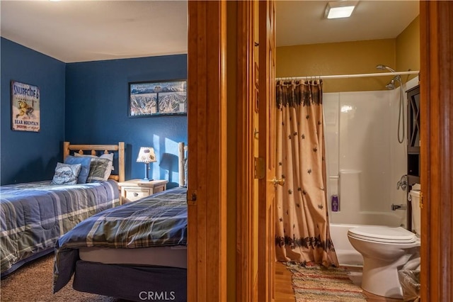 bedroom featuring hardwood / wood-style floors