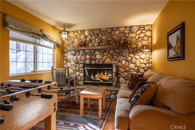 living room featuring a fireplace