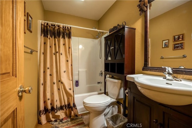 full bathroom with toilet, shower / bath combo, and vanity